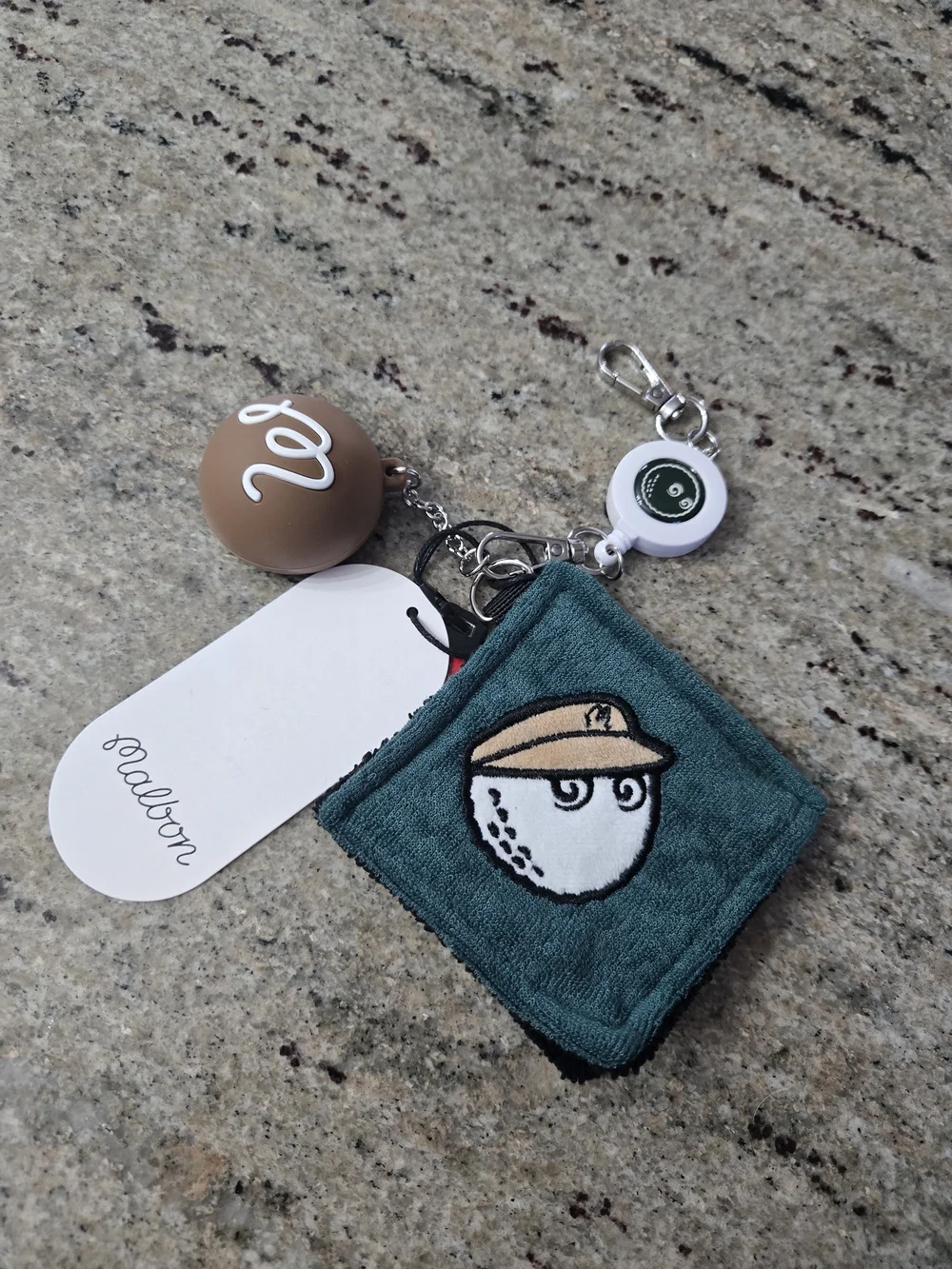 Malbon Golf Ball holder and towel